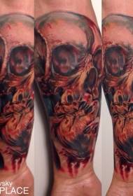 Arm color creepy human skull at heart tattoo