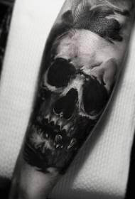 simple black skull small arm tattoo pattern