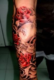 Arm colored skull and red rose tattoo pattern