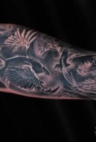 Male arm gray washed various crow tattoo patterns