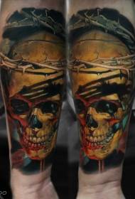 Colorful bloody human skull tattoo in arm realistic style