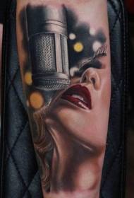 Arm realistic color female singer and vintage microphone tattoo
