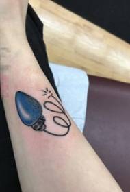 Schoolgirl's arm painted creative light bulb fresh tattoo picture