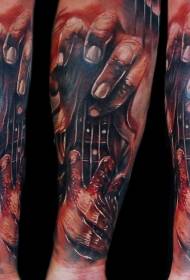 Colore di bracciu sanguinatu mudellu di tatuatore di chitarrista