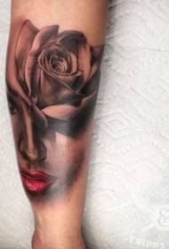Arm realistic looking rose with woman portrait tattoo