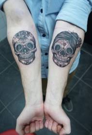 Female arm brown skull tattoo pattern
