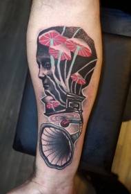 Arm surreal style gramophone and portrait tattoo