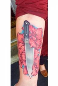 European and American dagger tattoo girl upper arm dagger and flower tattoo picture