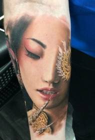 Colorful Asian geisha portrait tattoo pattern in arm realistic style
