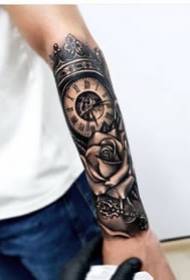 Black Arm Clock Tattoo - A set of black arm clock compass tattoos on a small arm
