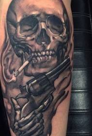 Arm smoking human skull with pistol tattoo pattern