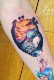 Arm new school style colored heart with forest tattoo