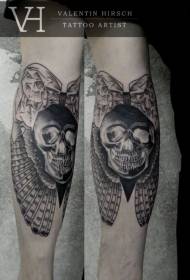 Arm black gray creepy human skull with wings tattoo