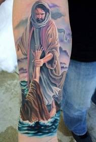 Padrão de tatuagem com tema religioso colorido de braço