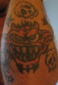 手臂尖齿红色恶魔和骷髅纹身图案