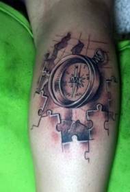 arm black gray style compass with jigsaw tattoo pattern