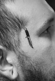 men's face small fresh dagger tattoo pattern