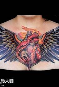 chest heart wing tattoo pattern