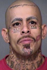 muški zastrašujući uzorak tetovaža lica