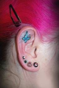 blue butterfly tattoo pattern on the ear