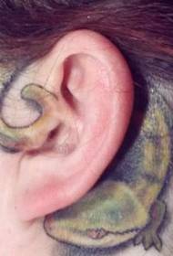 ear illustration style of colored small lizard tattoo pattern