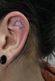 ear tattoo small pattern female girl's ear on the black sun tattoo picture  110724 - plant tattoo girl ears on black plant tattoo pictures