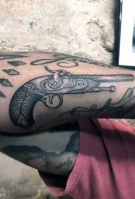 Arm black engraving style pistol tattoo pattern