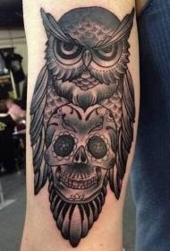 black owl with skull arm tattoo pattern
