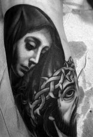носити тернистий малюнок татуювання Ісуса та Діви Марії