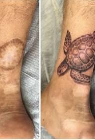 tatuaż pokryty blizną - działa kilka doskonałych blizn pokrywających wzór tatuażu