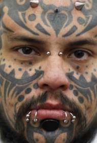 male face black water Maori style totem tattoo pattern
