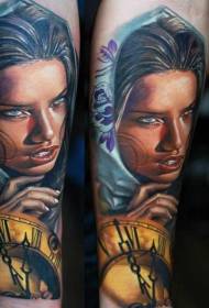 underarm realistic woman portrait with golden clock tattoo pattern