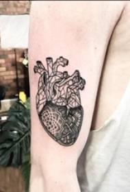 fiú fekete pont a karján, egyszerű vonal virág szív tetoválás képet