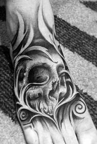 mysterious black skull instep tattoo pattern