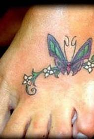 butterfly and white small flower instep tattoo pattern