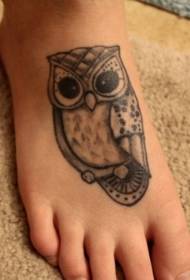 gray owl tattoo pattern on female instep