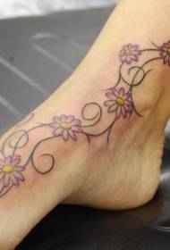 female Instep colored twig curly flower tattoo