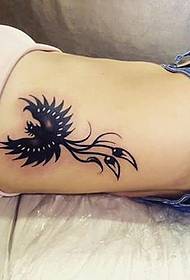 beautiful phoenix tattoo pattern on the female side rib