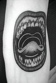 a funny tattoo that reveals the tongue and teeth of the mouth