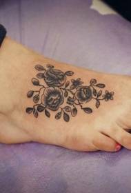 female instep gray ink flower tattoo pattern
