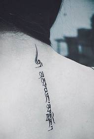 Foto tatoo Sanskri kolòn vètebral la se patikilyèman nòb
