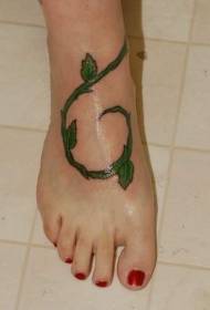 female instep color realistic green vine tattoo pattern