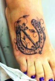 beautiful horseshoe and vine tattoo pattern on the instep