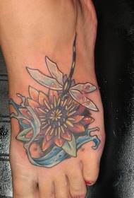 instep lotus და dragonfly tattoo model