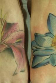 beautiful blue and pink lily tattoo pattern on the back