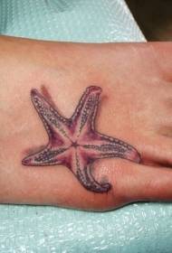 pink starfish tattoo pattern on the instep of the girl