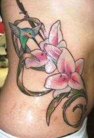 waist side beautiful flowers with hummingbird tattoo