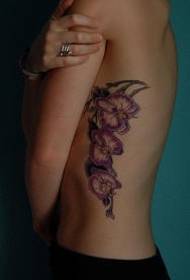 waist side pink orchid flower tattoo pattern