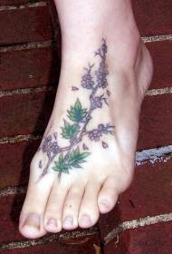 model i tatuazheve me lule me ngjyra dhe femra instep