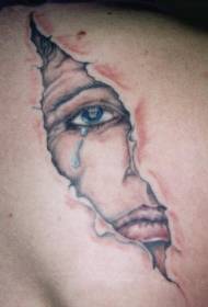 three-dimensional skin tear and crying face tattoo pattern